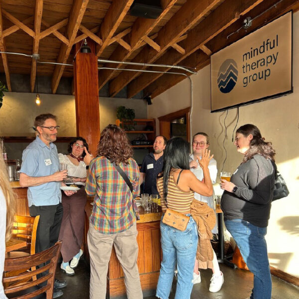 Providers mingle at a Mindful Therapy Group event