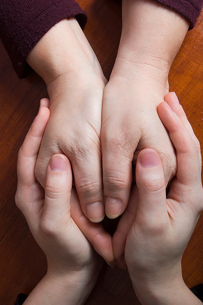 young person with a transgender pride flag