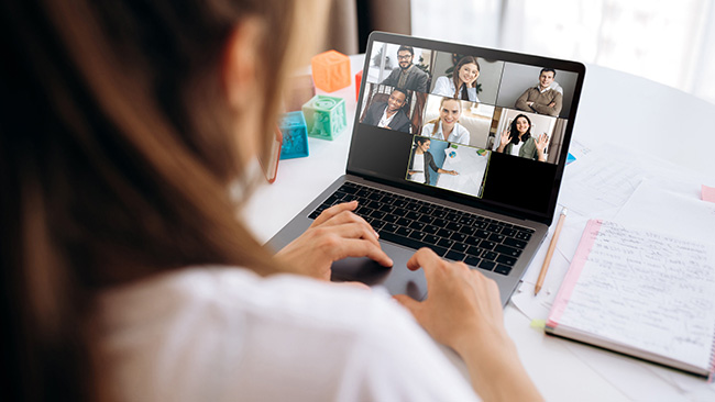A woman participates in a video conference