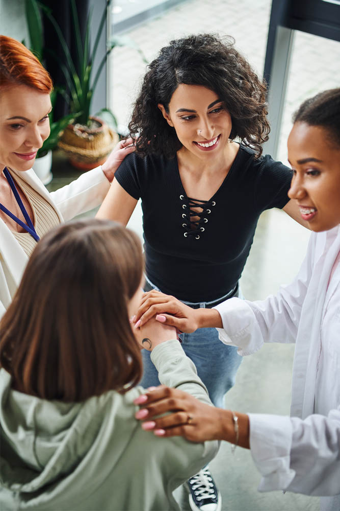 young person with a transgender pride flag