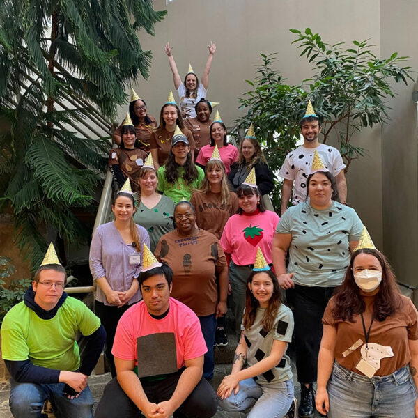 Mindful Support Services Intake Team group photo on the stairs of the Taylor's Landing Headquarters