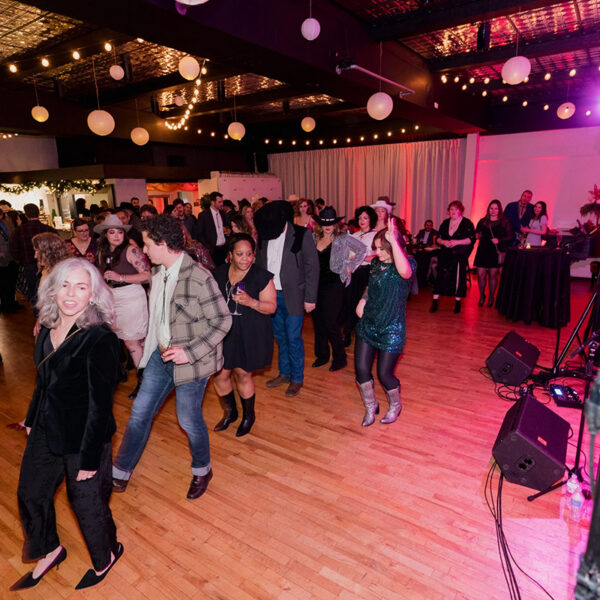 Mindful Support Services staff and providers line-dancing