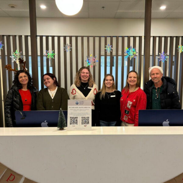 Mindful Therapy Group leadership celebrate Christmas with festive decorations and outfits